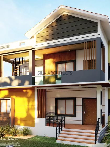 A stylish villa elevation design for a client in Thirthahalli, Shivamogga. The design features a sloping roof and a mix of modern materials, suited for a scenic location.