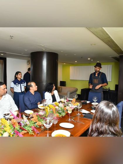 Guests listen intently as the chef explains the concept behind the 5-course menu during our fermented foods dinner. These events are educational and immersive.