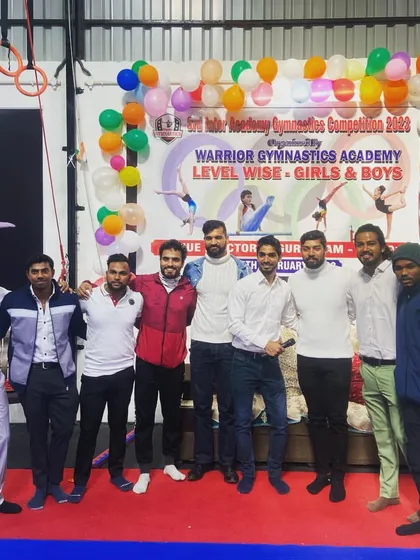 A group photo with fellow coaches at the Inter-Academy Gymnastics Championship in Gurugram. We are a community dedicated to promoting gymnastics.