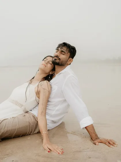 Lost in the moment on a misty beach. This is what pure, unscripted romance looks like. The soft light and the sound of the waves created a perfect atmosphere for this serene and intimate portrait.