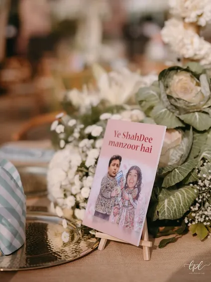We believe your wedding should feel like you. This custom placard with the playful phrase 'Ye ShahDee manzoor hai' is a perfect example of how we weave your personality and inside jokes into the decor, making the celebration uniquely yours.