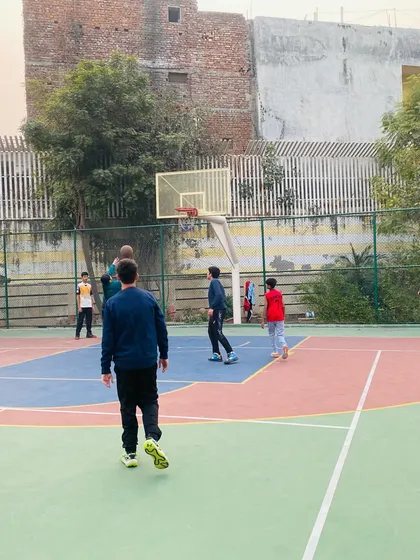A player takes an open shot, a result of good team ball movement.