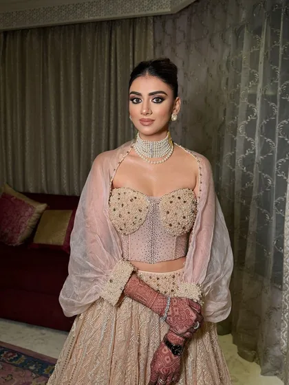 Ishani looked so chic for her sister’s cocktail. I created a smoky eye and nude lip look to complement her beautiful Tarun Tahiliani outfit.