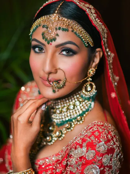 This is the standard of excellence we aim for. A flawless bridal look featuring classic smokey eyes and bold lips, showcasing the professional quality and attention to detail our students learn to master for high-end bridal clients.