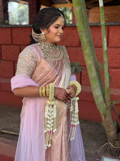 A portrait of the bride, her look completed with floral 'kaleeras'.