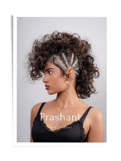 A professional portfolio shot of hair student Prashant's work, highlighting his skill with textured hair.