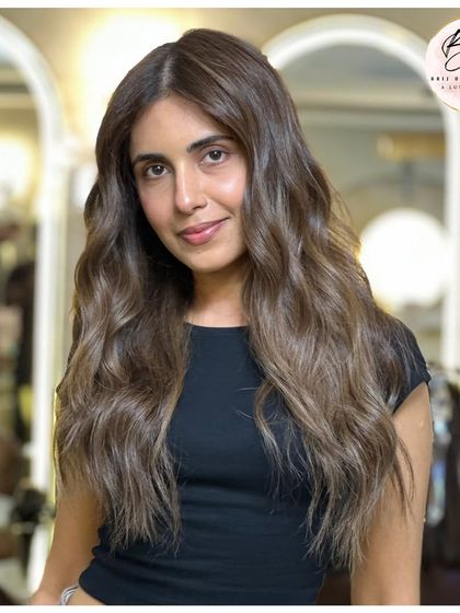 This Cool Chestnut Drift is a smoky chestnut shade with taupe depth. It's a cool-toned, effortless, and unique look.