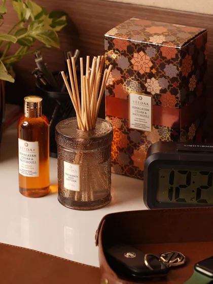 Our Himalayan Cedar & Patchouli reed diffuser set, complete with its elegant gift box. This makes a thoughtful and sophisticated gift for colleagues, clients, or to elevate your own office environment.