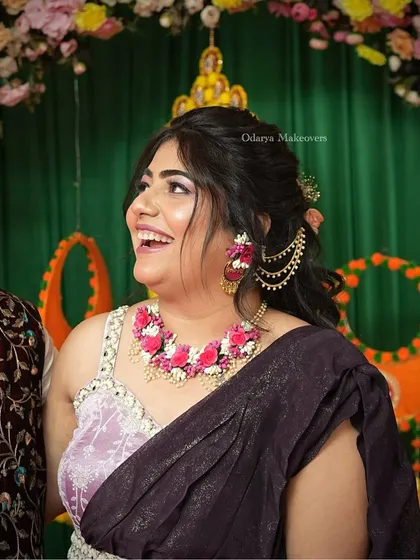 A joyful, candid moment from the Haldi ceremony. The bride's smile says it all. My job is to make sure she feels beautiful and carefree.