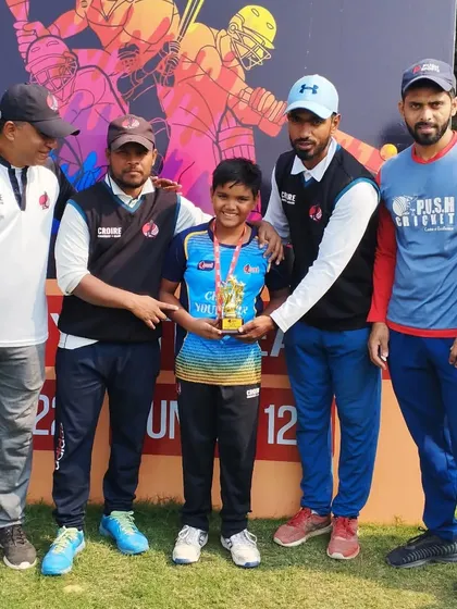 Saujas Jaiswal, who took a hat-trick, celebrating with his teammates and coaches after a fantastic performance in the semi-final.