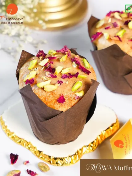 Our Mawa Muffin is a delightful fusion treat. This soft muffin is infused with traditional mawa flavor and garnished with pistachios and edible rose petals.