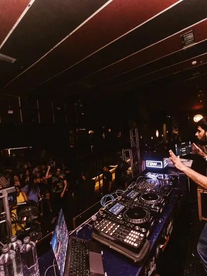 A view from my side of the decks, with the crowd going wild. Moments like these are why I love what I do. It's pure, unfiltered energy.