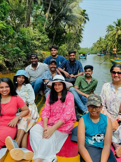 Another happy group enjoying the colorful boat ride through the coconut-lined backwaters of Honnavar.