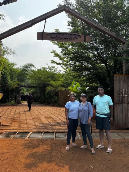 Our trekkers at the entrance of a resort, showing the comfortable stay options we provide.
