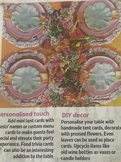 A close-up from the Times of India feature, highlighting the importance of a personalized touch and DIY decor, such as handmade tent cards and upcycled vases.