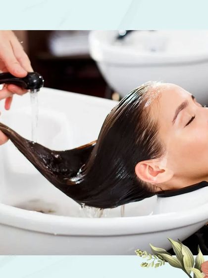 A visual hint for our trivia question. This image shows a client enjoying a relaxing hair wash, a key step in our rejuvenating hair spa treatment designed to restore shine and softness to tired, damaged hair.