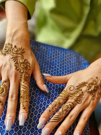 A modern and chic floral design for a wedding guest. This style looks great and can be done quickly by my team artists.