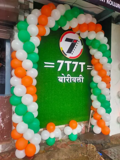 A vibrant tricolor balloon arch for a retail store, perfect for celebrating national holidays like Independence Day or Republic Day. This is a great way to show festive spirit and attract attention.