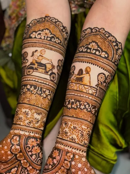 A close-up of the custom artwork depicting the couple on a scooter, a cherished memory immortalized in henna.