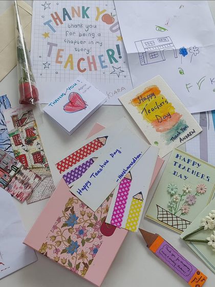 A collection of heartfelt, handmade cards from our students on Teachers' Day. These small tokens of love symbolize the deep trust and connection we share.