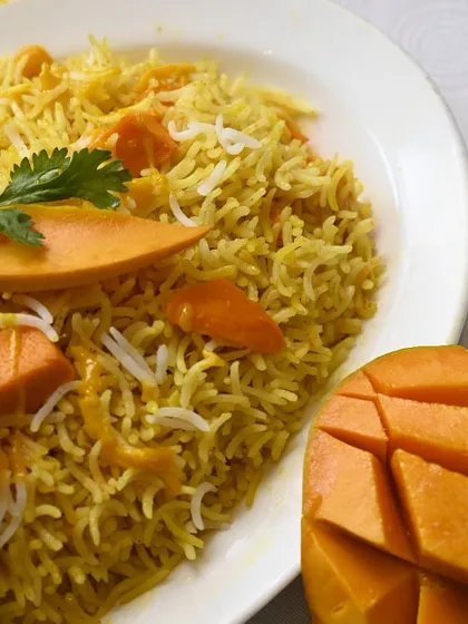 Can't decide between sweet and savory? Have both with our unique Mango Pulao, a fragrant rice dish cooked with fresh mango pieces.