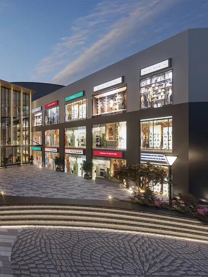 The design includes multi-level terraces and curved walkways, adding visual interest and creating different zones for shopping and leisure.