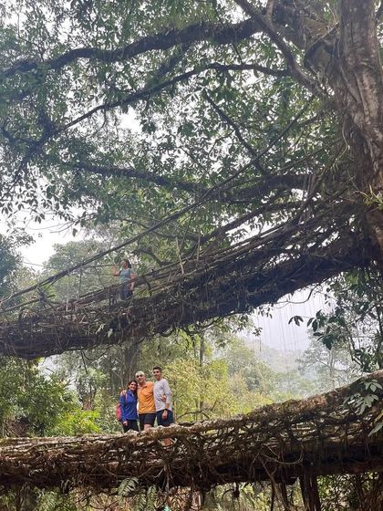Our family on the Living Root Bridge. The trek was challenging, with over 3500 steps, but this breathtaking sight made it all worthwhile.