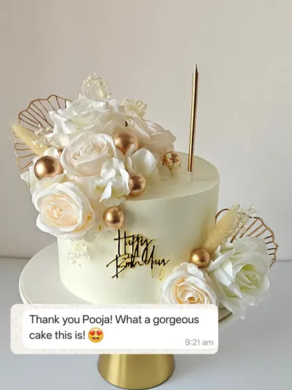 The beautiful white and gold floral cake paired with a message from the happy client calling it gorgeous.