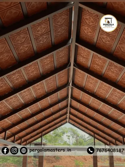 An upward view of a beautifully crafted Mangalore tile ceiling. The patterned tiles are laid with precision, showcasing the rich texture and earthy tones that make this roofing style so appealing.
