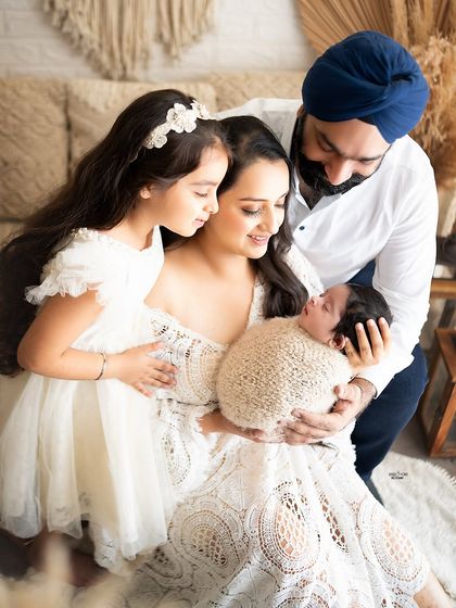 The whole family gathered around, admiring their newest little addition.