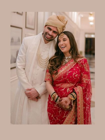 Laughter that lights up the room. This candid shot of Nehar and Varun at the Taj Mahal Palace shows their easy, happy connection.