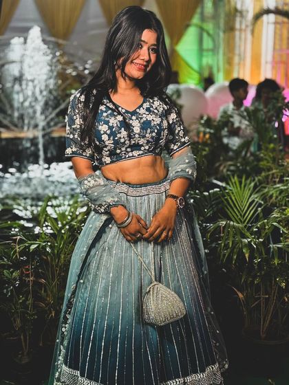 Our client looks exquisite in this blue ombre lehenga, a perfect choice for an evening reception or sangeet.