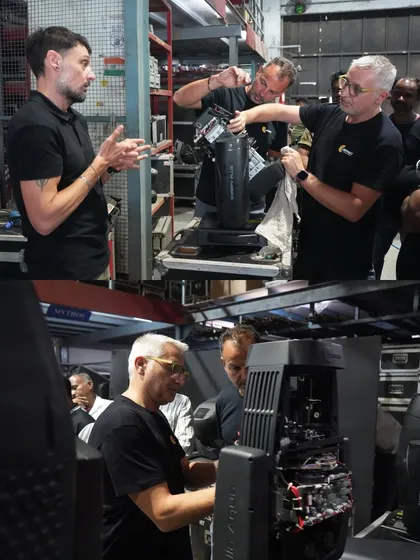 Claypaky specialists demonstrating the internal mechanics of their advanced lighting fixtures to our crew. This in-depth knowledge is crucial for on-set maintenance and performance.