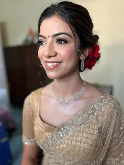 A beautiful, happy smile from this reception stunner. The makeup is timeless and sophisticated.