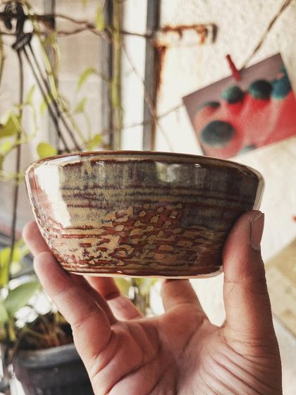 This student started with a one-time workshop and came back to begin his pottery journey. His pieces, like the quirky radio and the massive planter, are full of fun and character.