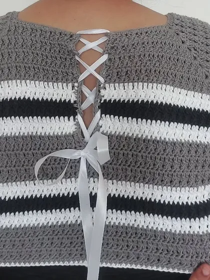 The back of the Diana Crop Top, showcasing the beautiful ribbon lacing that ensures a perfect, snug fit.