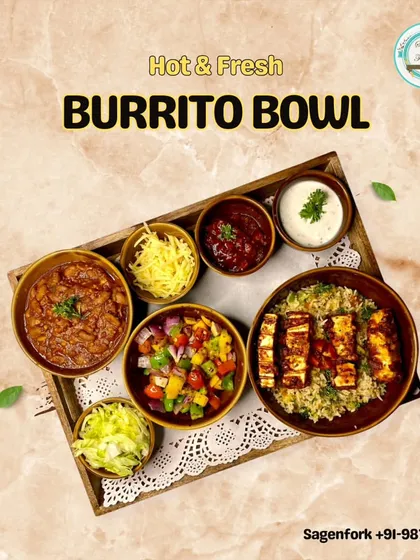 My hot and fresh Burrito Bowl is an ultimate Mexican delicacy. It's a complete meal with rice, beans, grilled paneer, salsa, and cheese, all ready to be mixed and enjoyed.