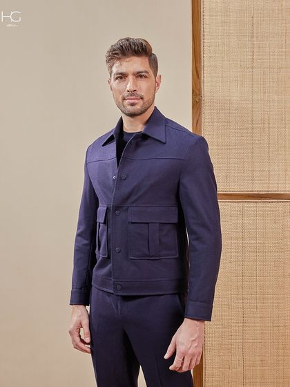 This navy monotone co-ord set, featuring a shacket with prominent pockets, is designed for both style and function. It’s a sharp, versatile look for any modern wardrobe.