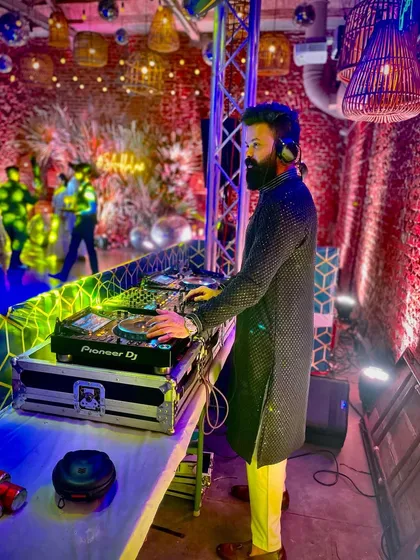 I am happiest behind the deck. Geared up and ready for a wedding cocktail party, focused on delivering an unforgettable set.
