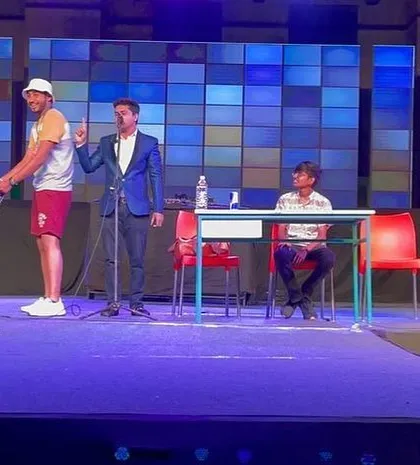 On stage during a performance at NIIT Rajasthan. College shows often involve a mix of comedy, magic, and interactive segments to keep the young audience engaged and entertained.