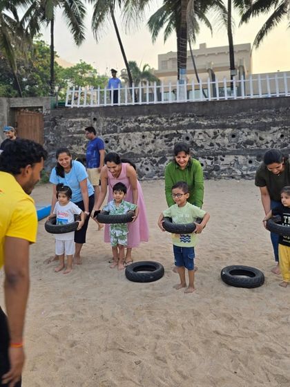 A group of toddlers getting ready for a tire-carrying race. We adapt our activities for the youngest age groups, ensuring they are safe, fun, and developmental.