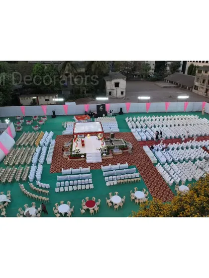 An aerial view of the complete engagement venue layout. This shows how we plan the entire space, including the central mandap, guest seating, and walkways, ensuring a comfortable and beautiful experience for everyone.