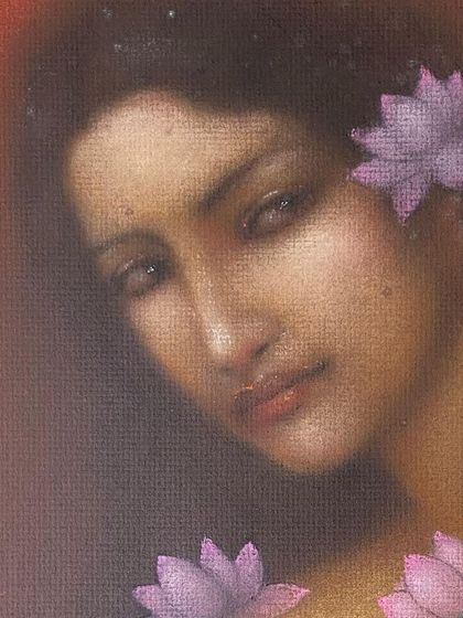 A delicate and evocative portrait by Suhas Roy. Known for his romantic and ethereal depictions of women, this piece showcases his mastery of creating mood and atmosphere, with the subject adorned with lotus flowers.