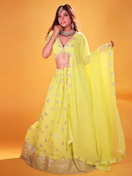 A classic three-quarter fashion pose. This studio shot is perfect for a model's portfolio, showcasing their ability to pose and connect with the camera.