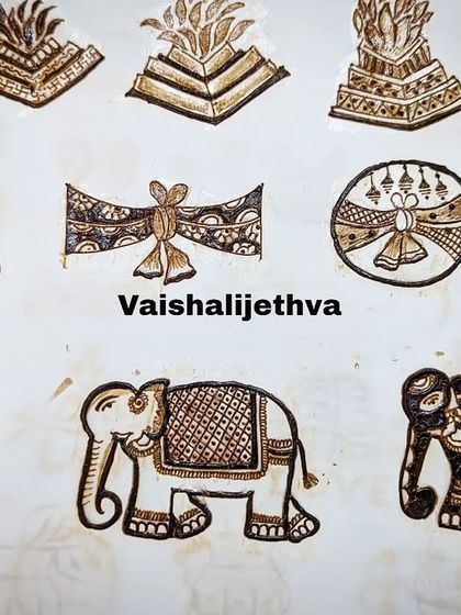 This sheet shows practice work for various bridal elements, including different styles of elephant motifs and decorative bows.