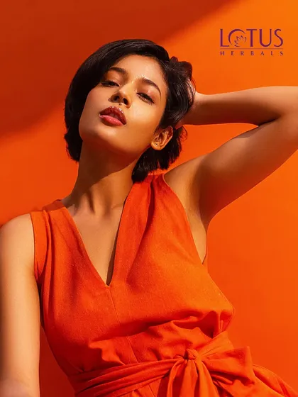 This is a key visual from our national campaign for Lotus Herbals. The goal was to create a bold, vibrant beauty shot that feels both sophisticated and modern, using strong color blocking and dramatic lighting to highlight the product's essence for print and digital ads.
