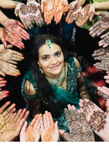 Mehandi is a celebration with friends and family. Here is a beautiful shot of a bride surrounded by her bridesmaids, all showing off the mehandi I did for the whole group.