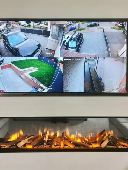 This is the end result of a clean installation: a live multi-camera view displayed seamlessly in a modern living room. We ensure your security system integrates perfectly with your home, allowing you to monitor your driveway, garden, and entrance from one screen.