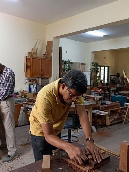 Pavan and Mohan, both fully engaged in their projects during a two-day hand tools workshop. They are learning to use hand planes and saws to create traditional joinery.