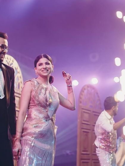 A grand entrance with sparklers. The bride's makeup is designed to be impactful and photogenic, ensuring she looks stunning in every moment of her celebration.